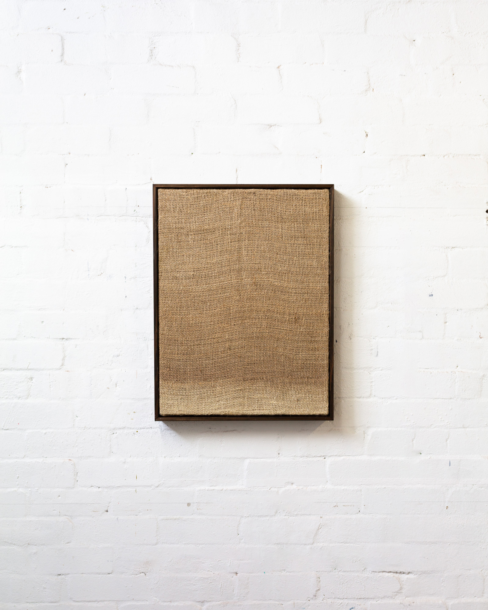 Transfer, 2020, hessian and bleach with artists frame, 61x46x4cm
